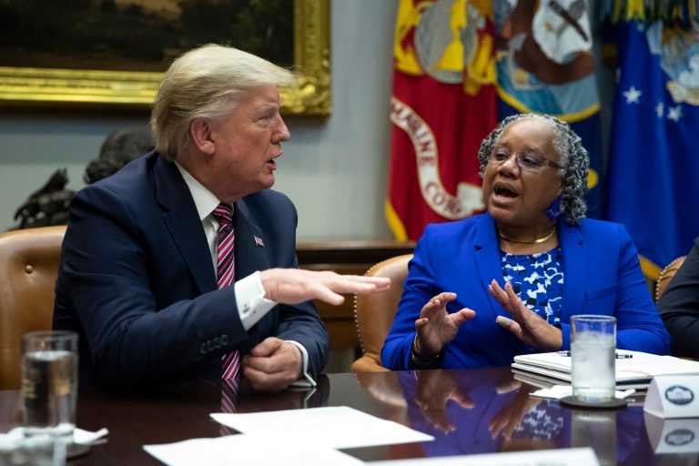 Barb Smith, president of Journey Steel, Inc., right, talks with President Donald Trump during a small business roundtable in the Roosevelt Room of the White House, Friday, Dec. 6, 2019, in Washington.