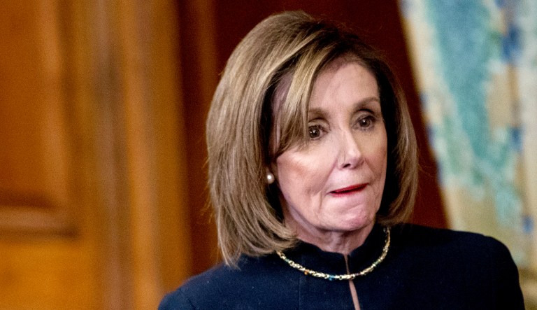 House Speaker Nancy Pelosi of California attends a news conference after the House votes to impeach President Trump, Wednesday, Dec. 18, 2019, on Capitol Hill in Washington. 