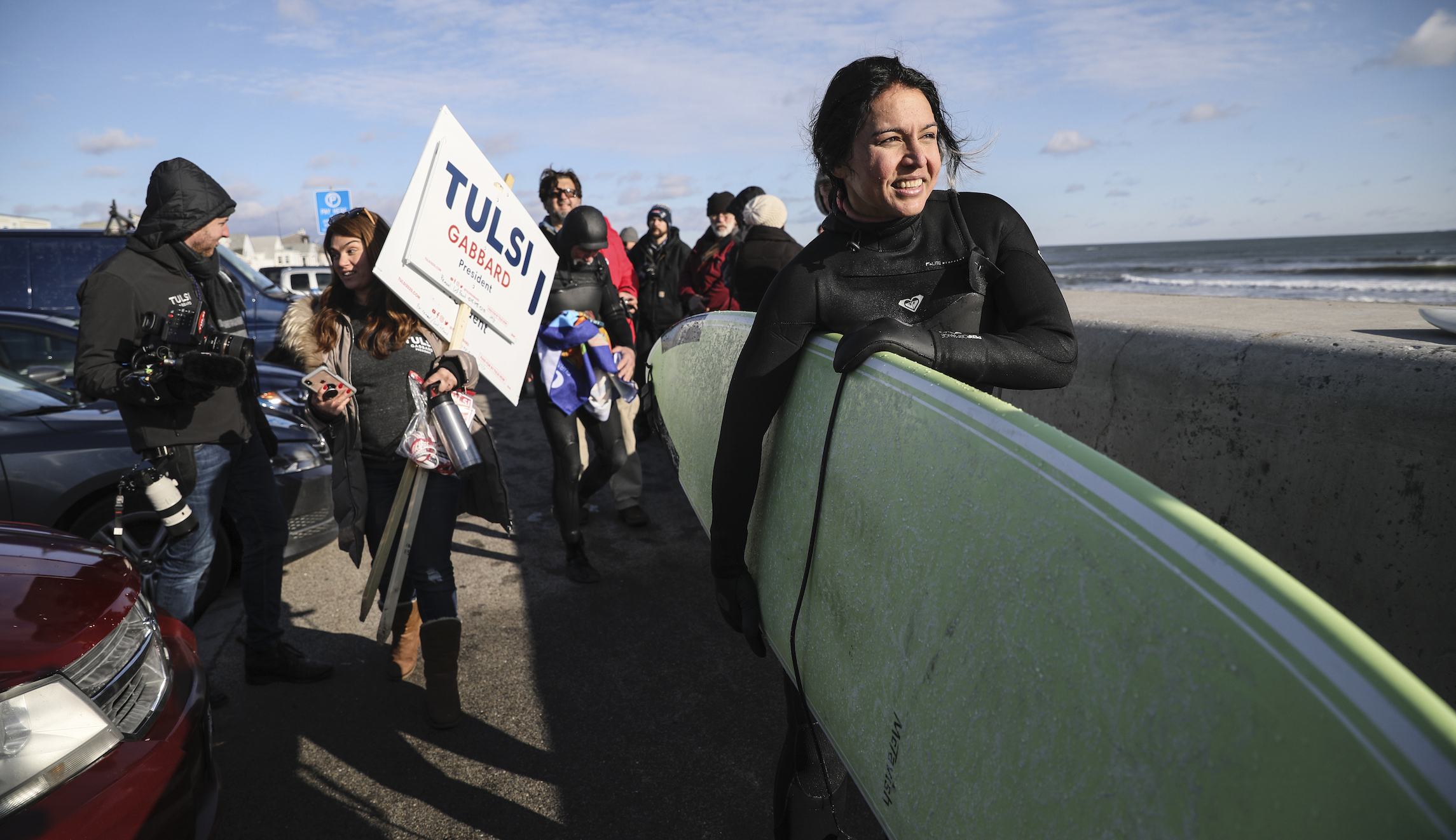 WATCH: Tulsi Gabbard surfs in New Hampshire on New Year’s Day
