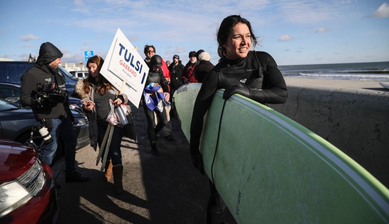 WATCH: Tulsi Gabbard surfs in New Hampshire on New Year’s Day