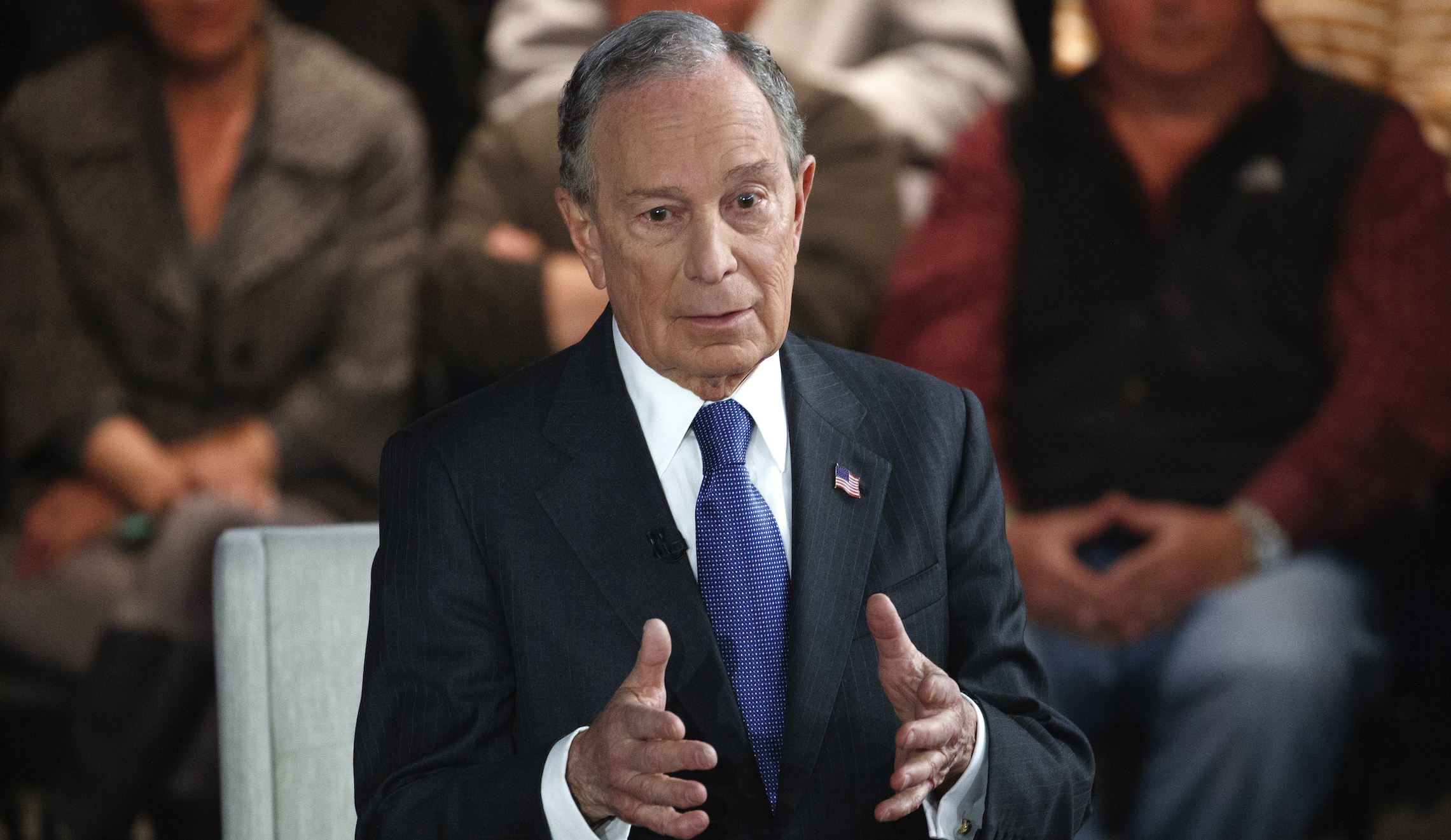 Bloomberg pressed on why he hasn't dropped out and backed Biden before Super Tuesday