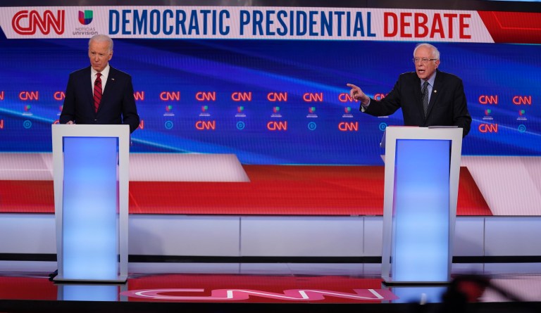 Biden and Sanders stand 6 feet apart at debate as coronavirus fears rise