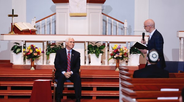 Pence provides a sympathetic ear in Iowa as clergy grapple with reopening churches