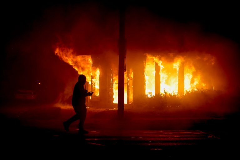 ‘Trying to stop them from hurting their own community’: Armed citizens protect businesses during Kenosha riots
