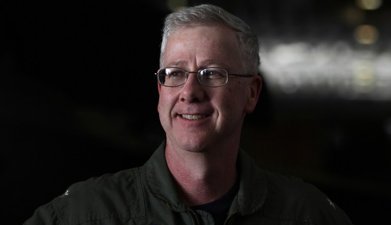 In this photo taken Thursday, Jan. 30, 2014, U.S. Rear Adm. Kevin Sweeney, of Wynnewood, Pa., left, and French Rear Adm. Eric Chaperon, right, talk to journalists aboard the French aircraft carrier FS Charles de Gaulle in the Gulf of Oman. The Truman Strike Group of military ships carried out combined operations with a French navy task force led by the aircraft carrier FS Charles de Gaulle. Ships from the two navies worked together on maritime security operations and training exercises.