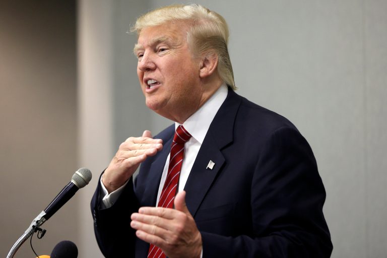 Republican presidential hopeful Donald Trump speaks to reporters before addressing the Republican Party of Arkansas Reagan Rockefeller dinner in Hot Springs, Ark., Friday, July 17, 2015.