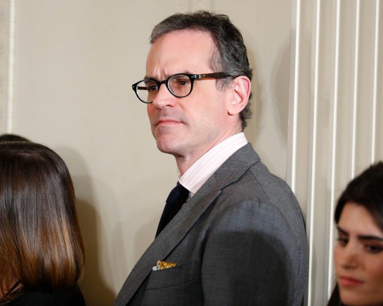 Michael Anton, National Security Adviser, waits in the East Room of the White House in Washington of the start of President Donald Trump's news conference, Thursday, Feb. 16, 2017.