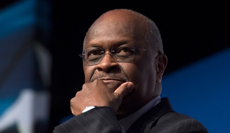 Herman Cain appears at an event.