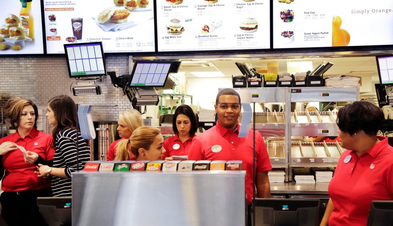 Employees familiarize themselves with the new Chick-fil-A restaurant.