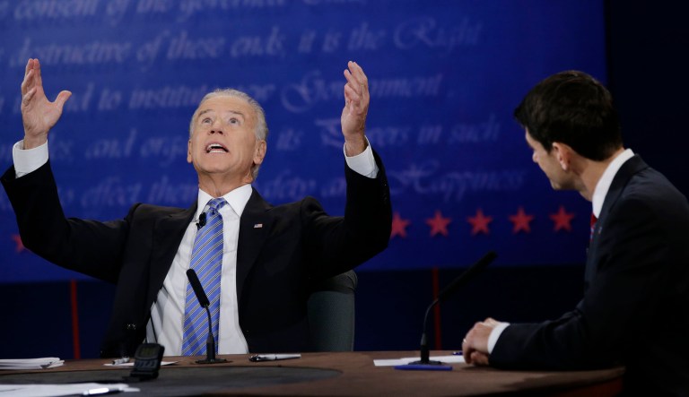 Republican vice presidential nominee Rep. Paul Ryan, of Wisconsin, right, watches as Vice President Joe Biden, speaks during the vice presidential debate at Centre College, Thursday, Oct. 11, 2012, in Danville, Ky.