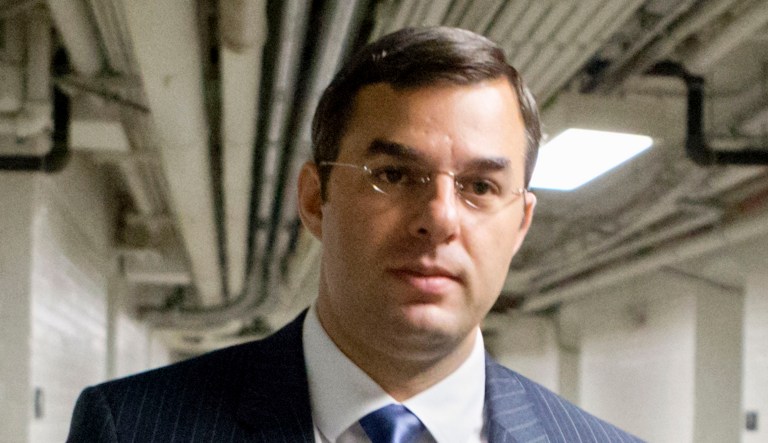 Rep. Justin Amash, R-Mich., walks through a basement tunnel to the House of Representatives in D.C.
