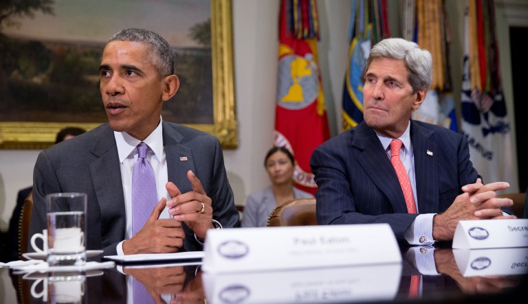 President Barack Obama, accompanied by Secretary of State John Kerry, discuss the Iran nuclear deal in the Roosevelt Room at the White House. 