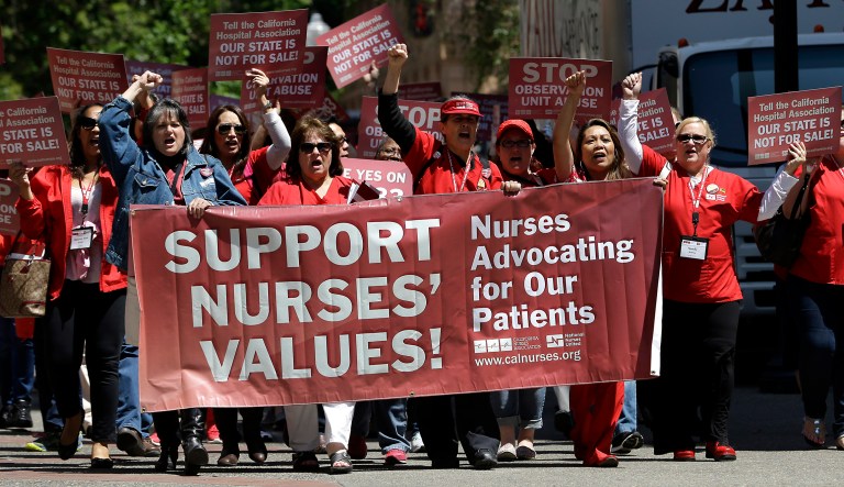 Hundreds of nurses and supporters march to the state Capitol calling for improved patient care, Sacramento, Calif., Tuesday, May 12, 2015. 