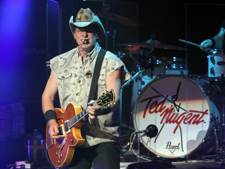 Ted Nugent performs during a concert.
