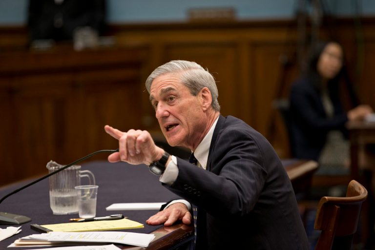 FBI Director Robert Mueller has a heated exchange with House Judiciary Committee member Rep. Louie Gohmert, R-Texas, over Gohmert's questions about FBI intelligence gathering on the suspects in the Boston Marathon bombings, Thursday, June 13, 2013, during the committee's oversight hearing on Capitol Hill in Washington. Mueller is nearing the end of his 12 years as head of the law enforcement agency and lawmakers had questions about the Boston attack, secretly gathered phone records of The Associated Press, the attacks in Benghazi, Libya, and leaks of classified government information.