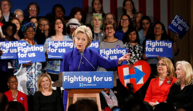 Democratic presidential candidate Hillary Clinton speaks at a Women for Hillary event at the New York Hilton hotel in midtown Manhattan one day ahead of the New York primary, Monday, April 18, 2016, in New York. Former Arizona congresswoman Gabrielle Giffords, second from right, and U.S. Sen. Kirsten Gillibrand, D-NY, right, listen.