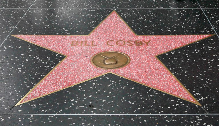 People walk past comedian/actor Bill Cosby's star on the Hollywood Walk of Fame on Hollywood Boulevard in Los Angeles Thursday, July 9, 2015. A coalition of black civil rights activists is calling on the Hollywood Chamber of Commerce to remove Cosby's star from the Hollywood Walk of Fame on Thursday. The Hollywood Chamber of Commerce released a statement saying it has never removed a star from the walk and will not do so in Cosby's case.