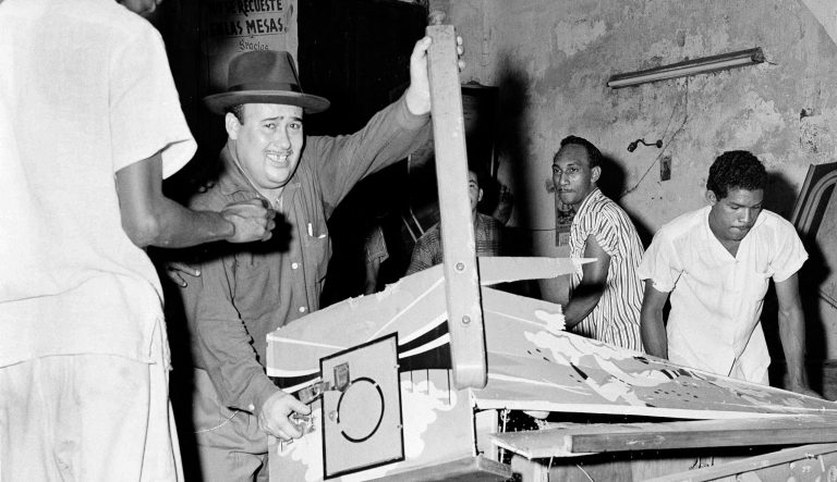 Looters wreck gaming machines at one of Havana's many plush casinos during rioting over the fall of the Batista regime, Jan. 1, 1959.
