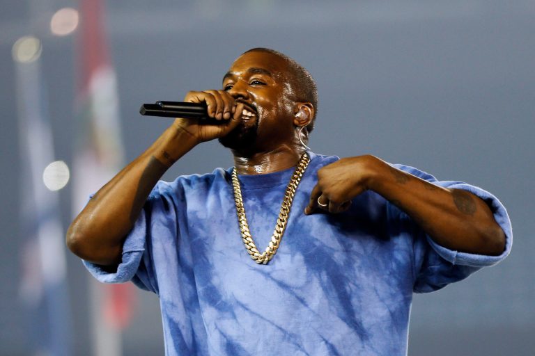 FILE - In this July 26, 2015, file photo, Kanye West performs during the closing ceremony of the Pan Am Games in Toronto. Kanye West, Beck, the Strokes and the Killers are set to perform at the three-day 2016 Governors Ball Music Festival in June.