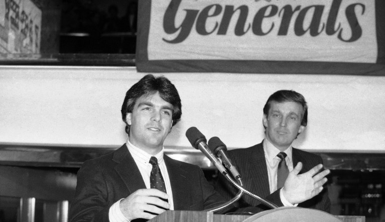 Boston College quarterback Doug Flutie tells a New York news conference that he has signed a $7 million multi-year contract with the New Jersey Generals as the United States Football League team's owner Donald Trump listens, right, Feb. 5, 1985.
