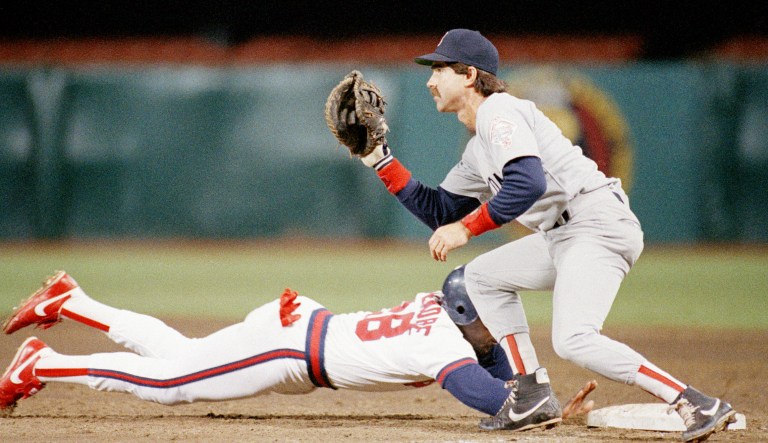 California Angels second baseman Mark Mclemore slides back into first base ahead of the tag by Boston Red Sox first baseman Bill Buckner in the second inning of Friday nightâs game in Anaheim, Calif., on May 1, 1987.