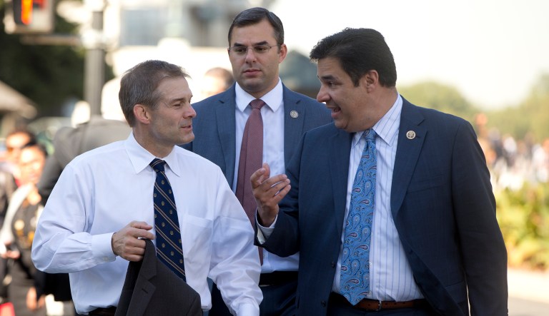 Chair of the Freedom Caucus Rep. Jim Jordan, R-Ohio, left, walks with fellow Freedom Caucus members,  Rep. Justin Amash, R-Mich., center, and Rep. Raul Labrador, R-Idaho, fright, from the Capitol to the Longworth House Office Building on Capitol Hill in Washington, Wednesday, Oct. 21, 2015.