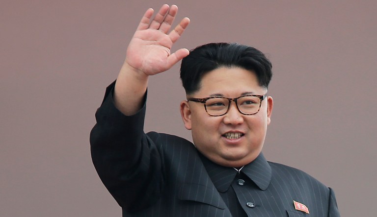 North Korean leader Kim Jong Un waves at parade participants at the Kim Il Sung Square in Pyongyang, North Korea. Hundreds of thousands of North Koreans celebrated the country's newly completed ruling-party congress with a massive civilian parade featuring floats bearing patriotic slogans and marchers with flags and pompoms. 