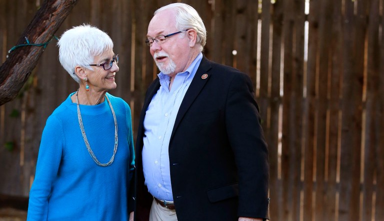 Democratic incumbent Rep. Ron Barber walks with wife Nancy Barber, left, after the two found out that he lost his Congressional seat to Republican Martha McSally in a 167-vote loss in a recount announced Wednesday, Dec. 17, 2014, in Tucson, Ariz.  Republicans will have their largest U.S. House majority in 83 years when the new Congress convenes next month after a recount in Arizona gave the final outstanding race to the Republican challenger.