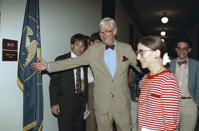 Sen. Daniel Patrick Moynihan, D-N.Y., escorts Federal Appeals Judge Ruth Bader Ginsburg on Capitol Hill on Tuesday, June 16, 1993 during her nomination to the Supreme Court. Brookings' Stephen Hess helped to win the senator's help to shepherd her nomination.