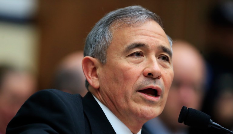 U.S. Pacific Command Commander Adm. Harry Harris Jr. testifies on Capitol in Washington.