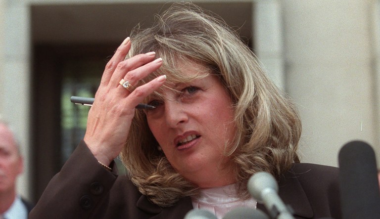Linda Tripp, the Pentagon employee whose secret tape recordings of former White House intern Monica Lewinsky triggered a criminal investigation of President Bill Clinton, talks to reporters on July 29, 1998.