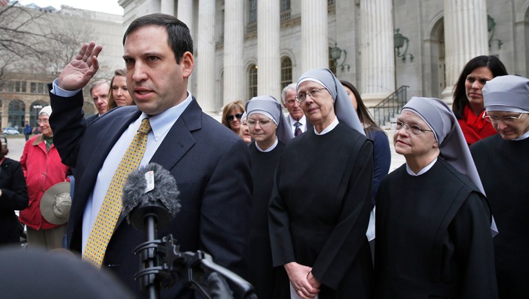 File - In this Dec. 8, 2014, file photo, lawyer Mark Rienzi, representing Little Sisters of the Poor, speaks to members of the media after attending a hearing in the 10th U.S. Circuit Court of Appeals.