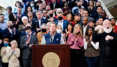 Democrats split over Georgia election law boycott