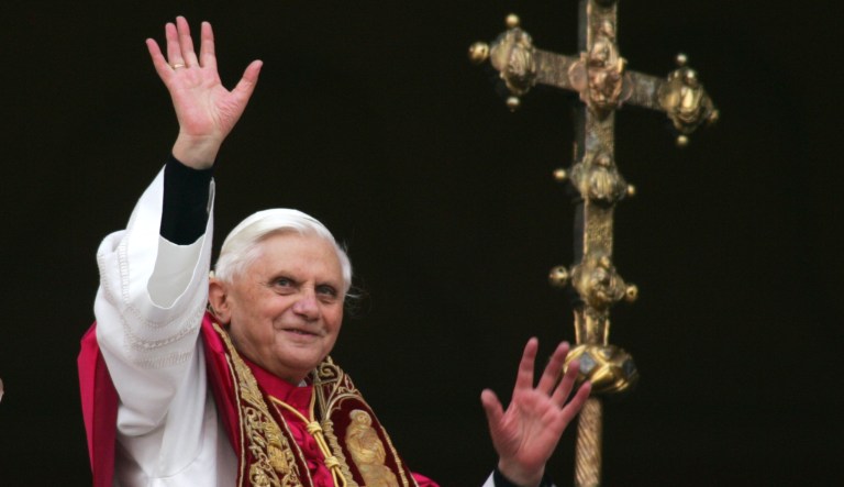 Newly elected Pope Benedict XVI, the former Cardinal Joseph Ratzinger of Germany,  waves to the crowd from the central balcony of St. Peter's Basilica, at the Vatican, in this Tuesday, April 19, 2005 file photo. 