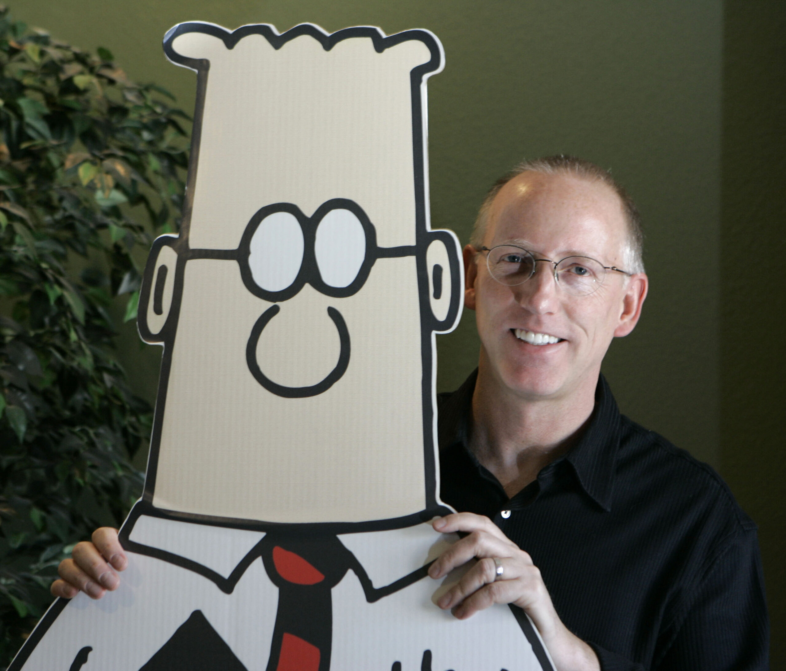 Dilbert creator says 77 newspapers canceled comic strip as it tackles woke culture