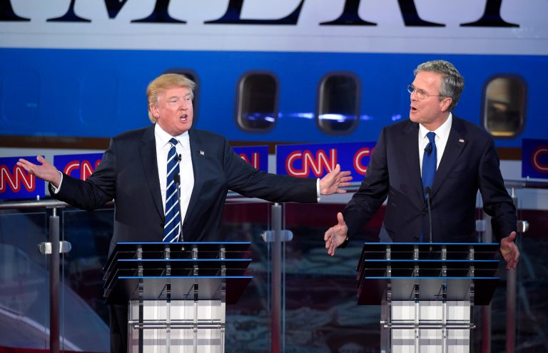 Republican presidential candidate Donald Trump, left, and former Florida Gov. Jeb Bush talks over each other during the CNN Republican presidential debate at the Ronald Reagan Presidential Library and Museum, Wednesday, Sept. 16, 2015, in Simi Valley, Calif. 