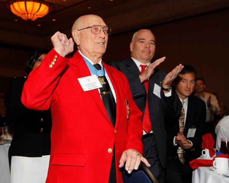 Medal of Honor recipient Hershel Williams, front, reacts as he is introduced during the 2012 Medal of Honor luncheon presented by the National Foundations of Patriotism in Atlanta, Friday, May 11, 2012, in Atlanta. (AP Photo/John Bazemore)  