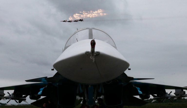 Massive fire erupts after fighter jet crashes into Russian apartment complex