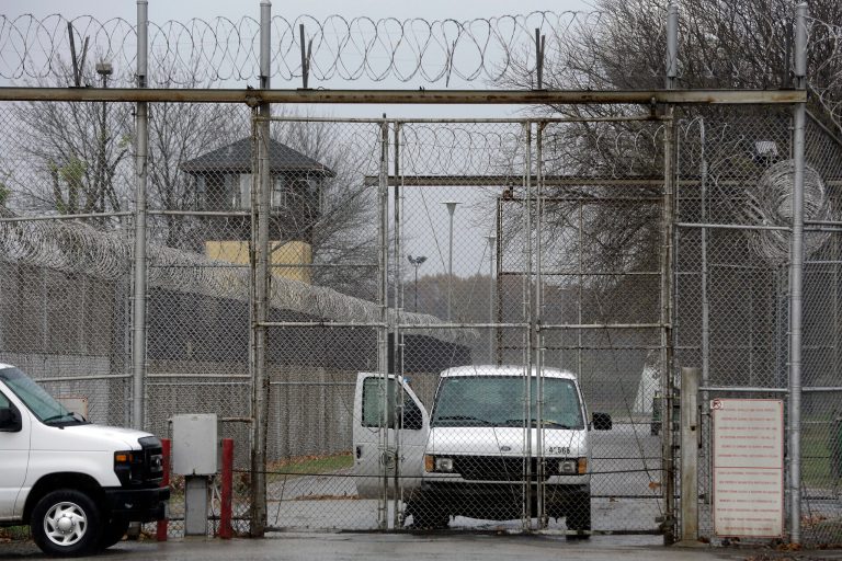 Security fences surround the Logan Correctional Center Friday, Nov. 18, 2016, in Lincoln, Ill. (AP Photo/Seth Perlman)