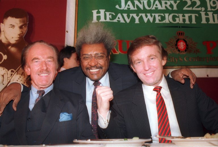 Donald Trump, right, pictured with his father, Fred Trump, left, and boxing promoter Don King participate in news conference in Atlantic City, N.J. in December 1987.