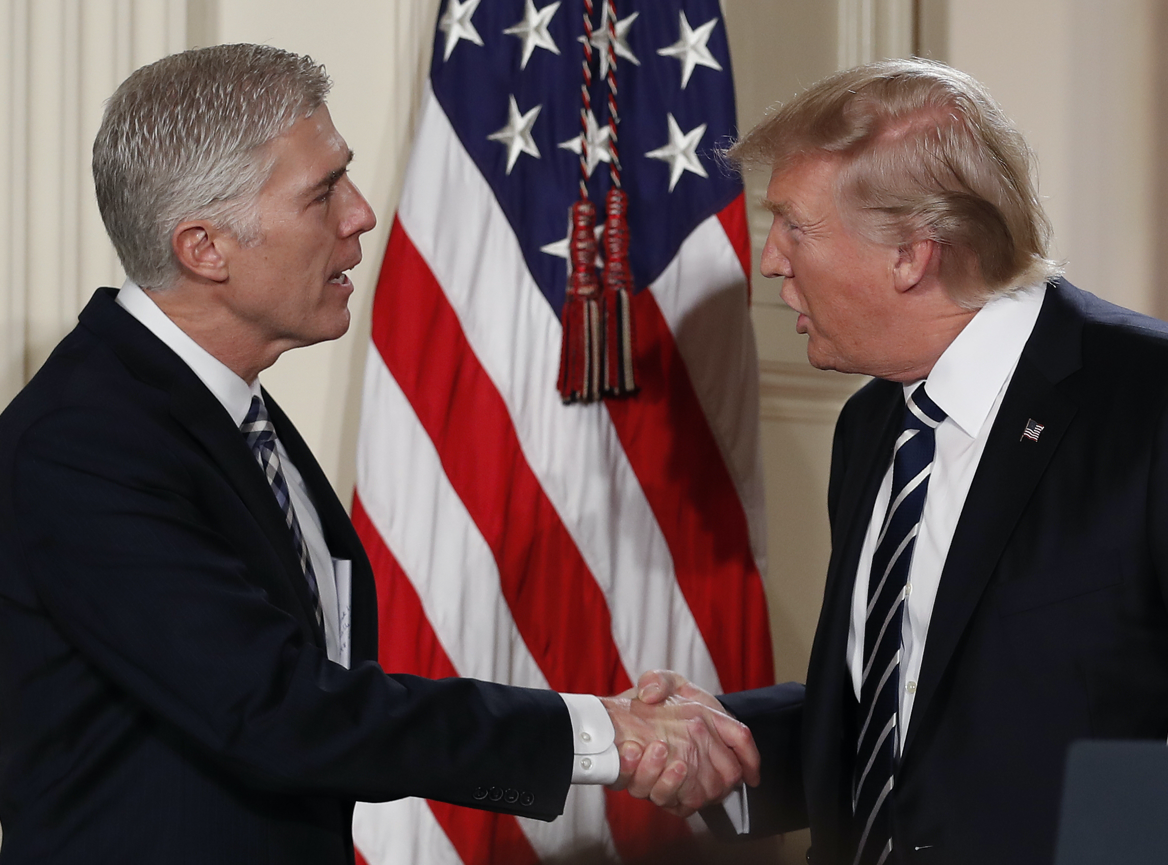Conservative grumbling amid applause for Trump’s Supreme Court list