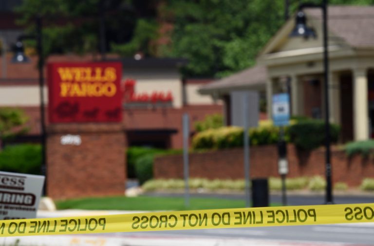 Five hostages uninjured and suspect arrested after Minnesota bank standoff ends