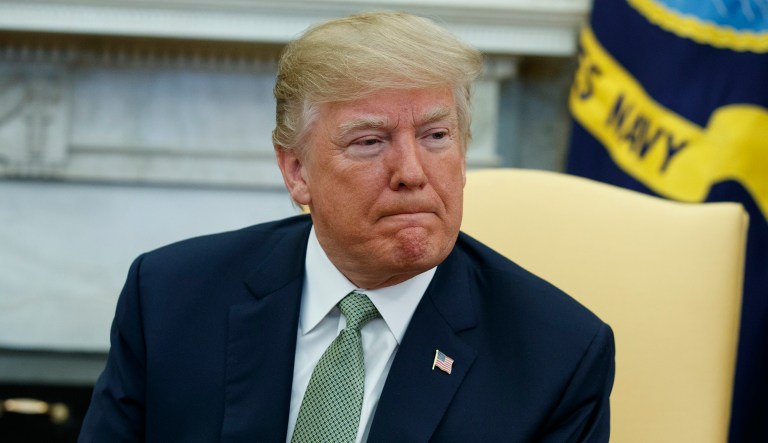 President Trump listens to a question during a meeting with Irish Prime Minister Leo Varadkar in the Oval Office of the White House.