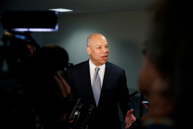 Former Homeland Security Secretary Jeh Johnson speaks to media.