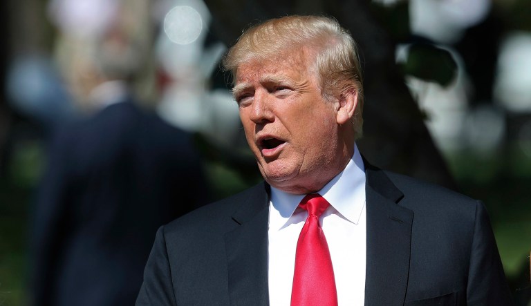 President Trump stops to speak to members of the media at Episcopal Church of Bethesda-by-the-Sea in Palm Beach, Fla.  