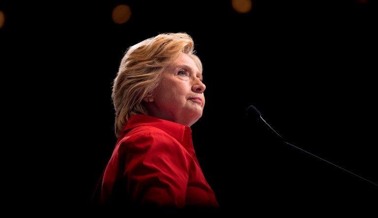 Former Democratic presidential candidate Hillary Clinton pauses while speaking at a rally in Pittsburgh.