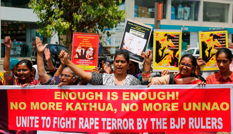 Indian women shout slogans during a protest against recent incidents of rape. The gang rape and killing of a Muslim girl in Kathua has seen far different protests: members of a radical Hindu group have marched to demand the release of the six men accused of repeatedly raping the girl inside a Hindu temple. 
