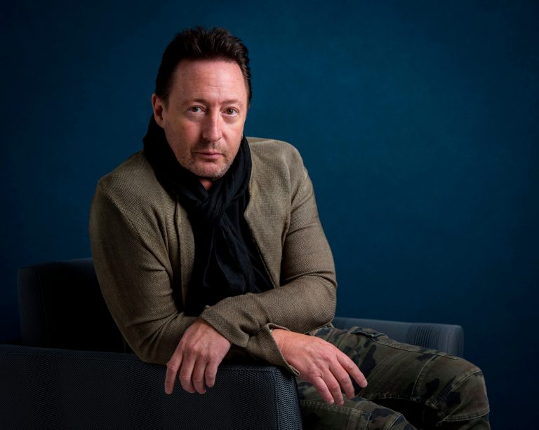 Julian Lennon participated in the Global Citizen's Stand Up for Ukraine social media rally on April 8, 2022. In this April 12, 2017 photo, Julian Lennon poses for a portrait in New York. (Photo by Drew Gurian/Invision/AP, File)