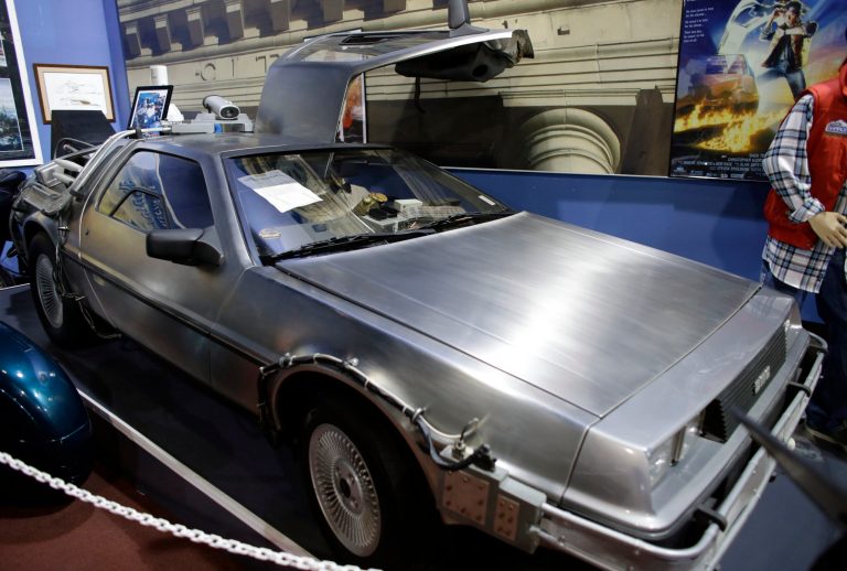 FILE â This Tuesday, Dec. 24, 2013, file photo shows a 1981 DeLorean DMC-12 sports car decorated to resemble the vehicles used to portray a time machine in the 