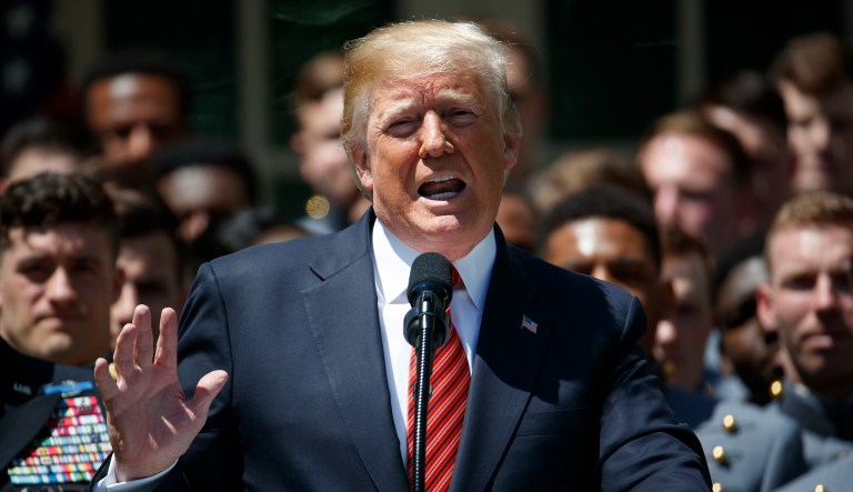 President Trump speaks during a ceremony to present the Commander in Chief trophy to the U.S. Military Academy football team in the Rose Garden. 